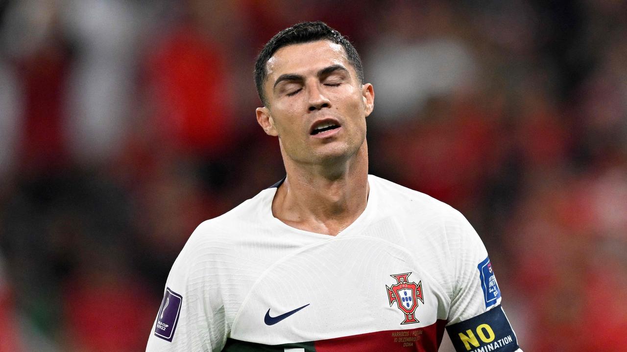 Portugal's forward #07 Cristiano Ronaldo reacts during the Qatar 2022 World Cup quarter-final football match between Morocco and Portugal. (Photo by PATRICIA DE MELO MOREIRA / AFP)