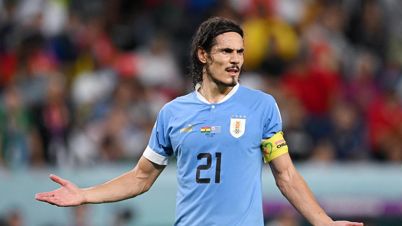 Uruguay striker Edinson Cavani is accused of throwing the VAR monitor to the ground on the way to the changing room tunnel in the aftermath of an ugly Referee clash during the FIFA World Cup in Qatar. (Photo by Clive Mason/Getty Images)