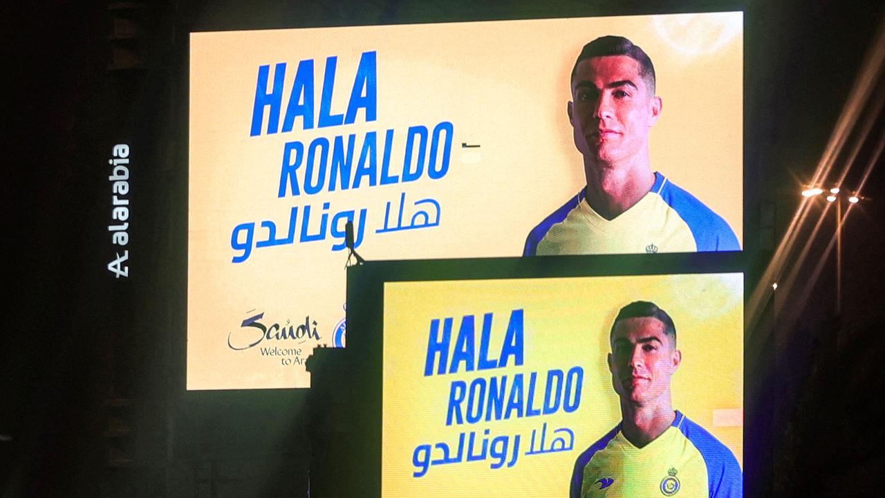 A picture taken early January 3, 2023 in Riyadh, shows billboards welcoming the arrival of Cristiano Ronaldo to Arabia's Al Nassr club. (Photo by Fayez Nureldine / AFP)