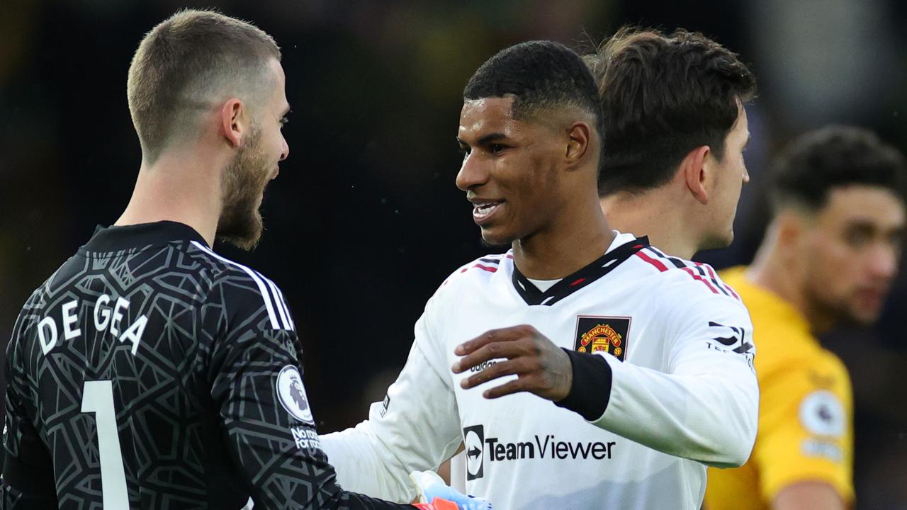 David De Gea of Manchester United celebrates their side's win with teammate Marcus Rashford.