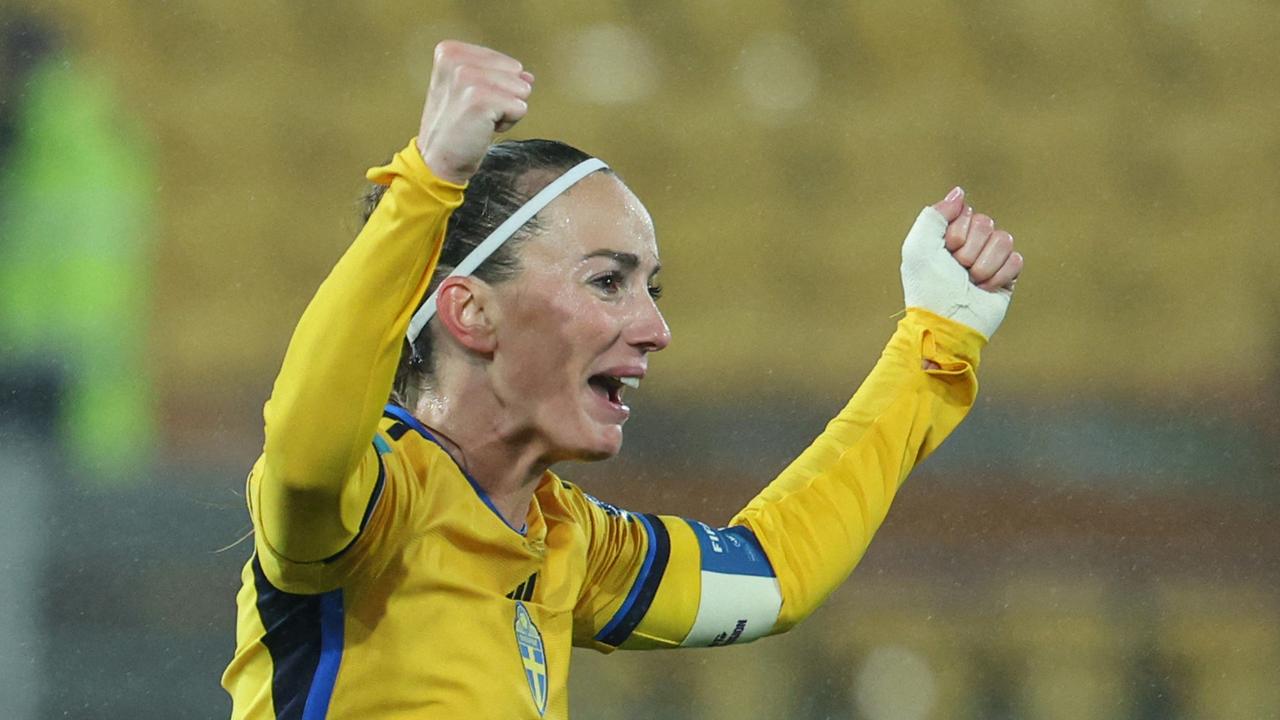 Kosovare Asllani celebrates a late winner for Sweden. (Photo by Marty MELVILLE / AFP)