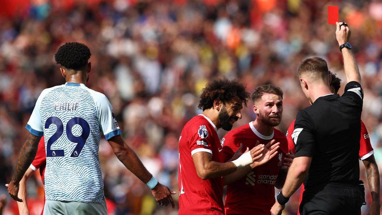 Mac Allister was shown a red card. (Photo by Darren Staples / AFP)