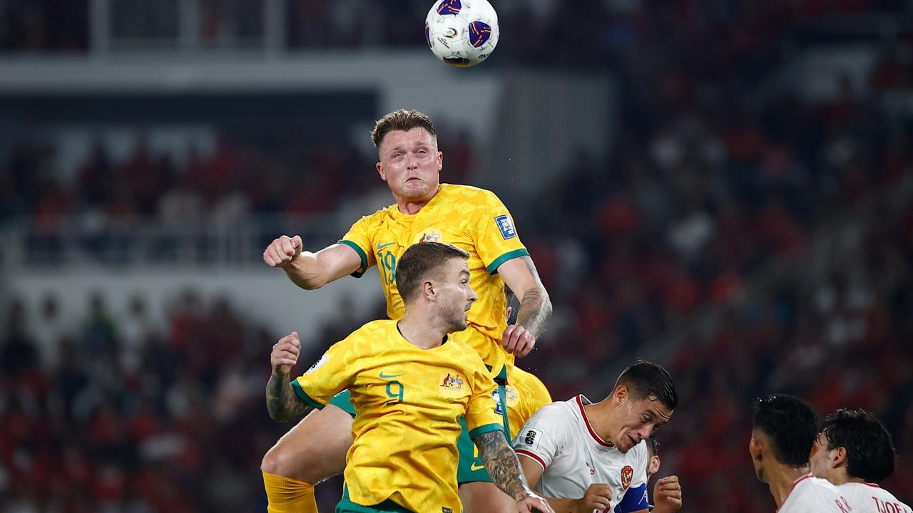 JAKARTA, INDONESIA – SEPTEMBER 10: Harry Souttar of Australia heads the ball during the FIFA World Cup Asian 3rd Qualifier Group C match between Indonesia and Australia at Gelora Bung Karno Stadium on September 10, 2024 in Jakarta, Indonesia. (Photo by Robertus Pudyanto/Getty Images)